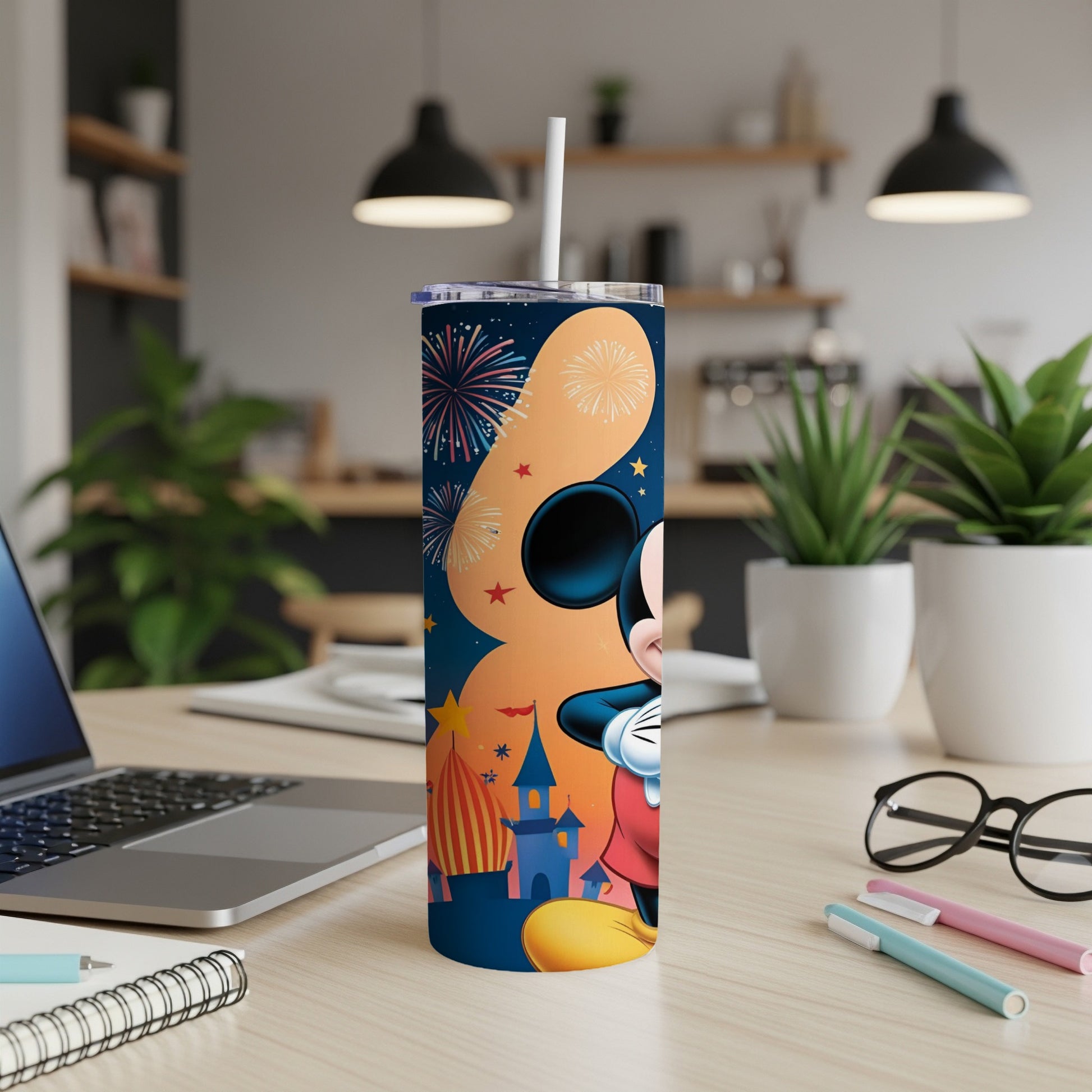 Mickey Mouse on a tumbler with fireworks and a carnival scene.