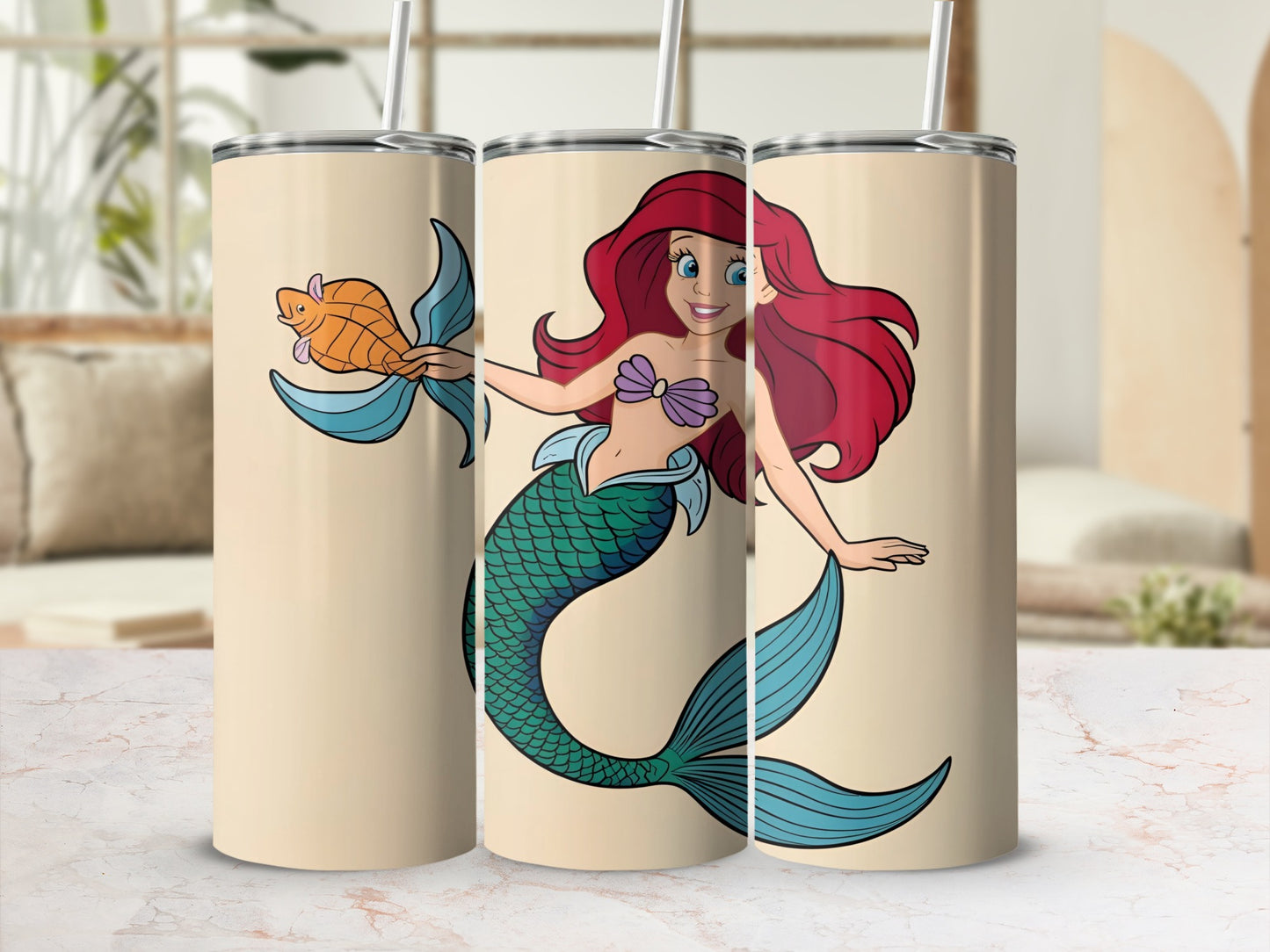 Mermaid holding a fish, beige tumbler with cartoon illustration.