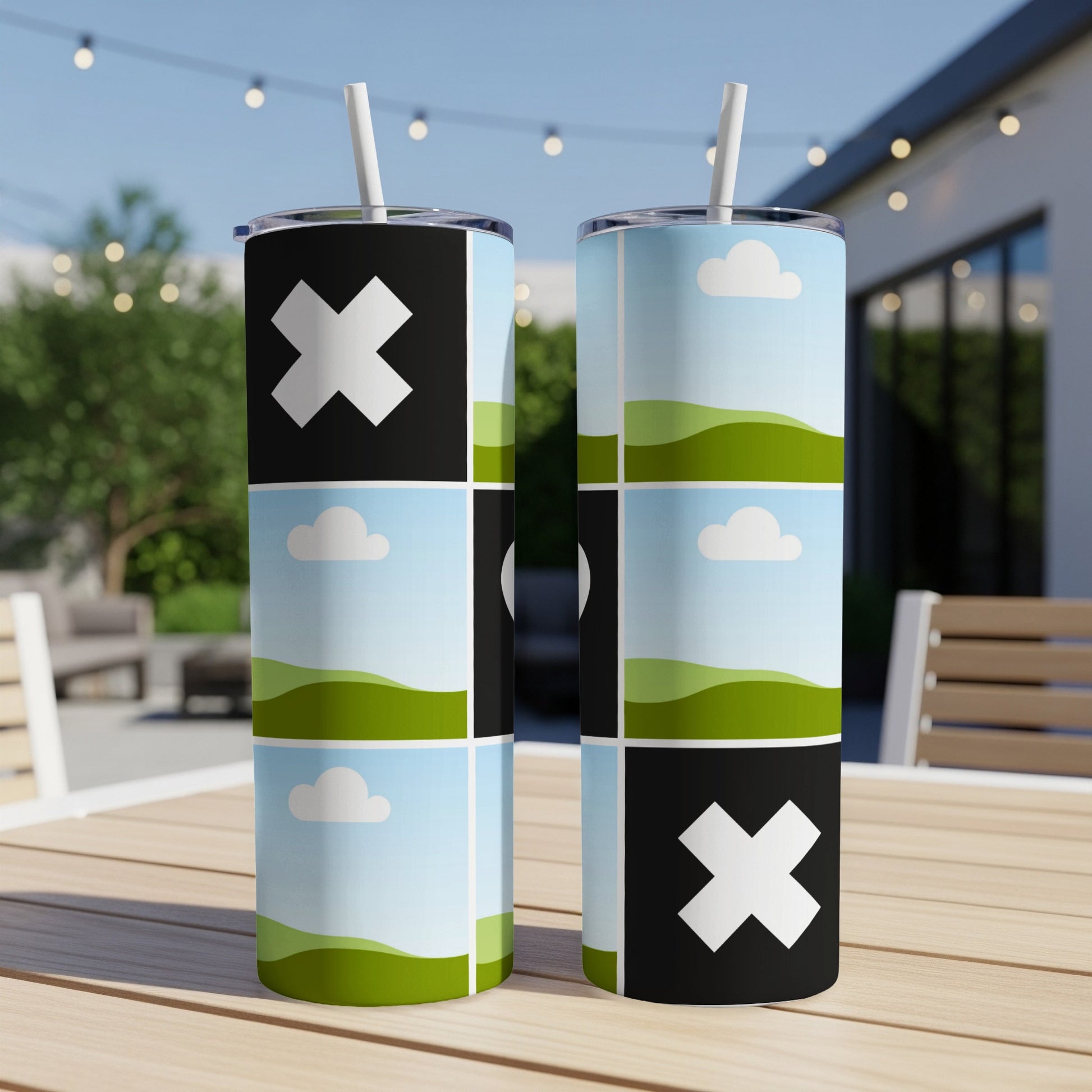 Two tumblers with a repeating pattern of white crosses on black squares and landscape images.