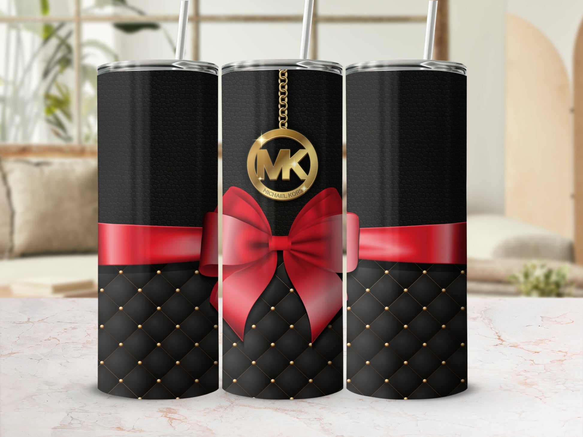 Elegant Black and Red Tumbler with Gold MK Charm Design