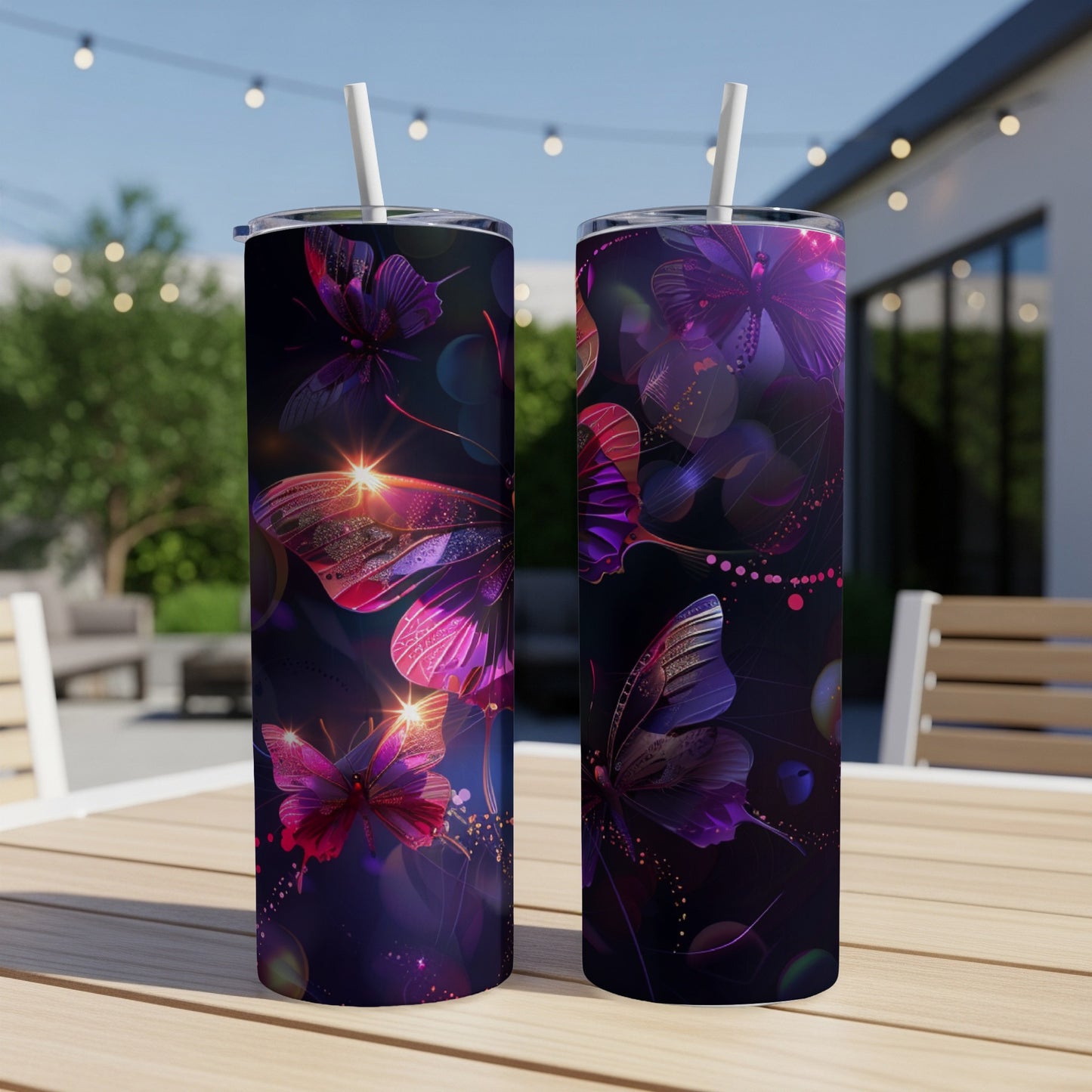 Two tumblers with glowing purple and pink butterfly designs.