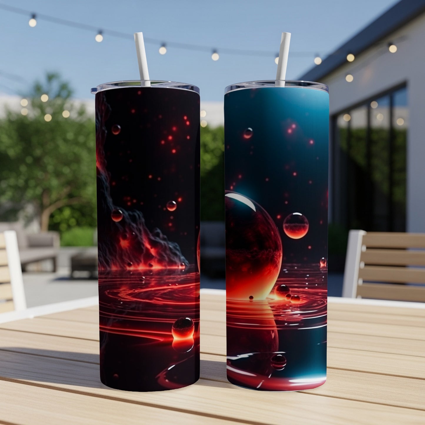 Two tumblers with a dark, cosmic scene of planets and glowing orbs.