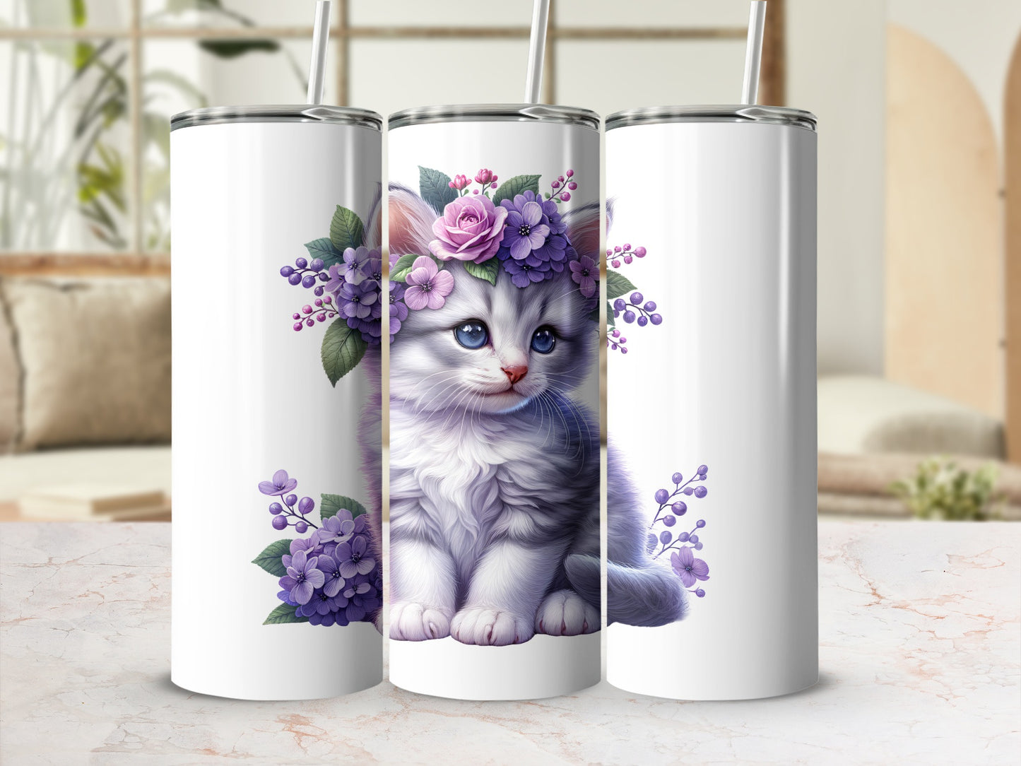 White tumbler with a fluffy kitten wearing a flower crown and floral accents.