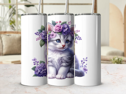 White tumbler with a fluffy kitten wearing a flower crown and floral accents.