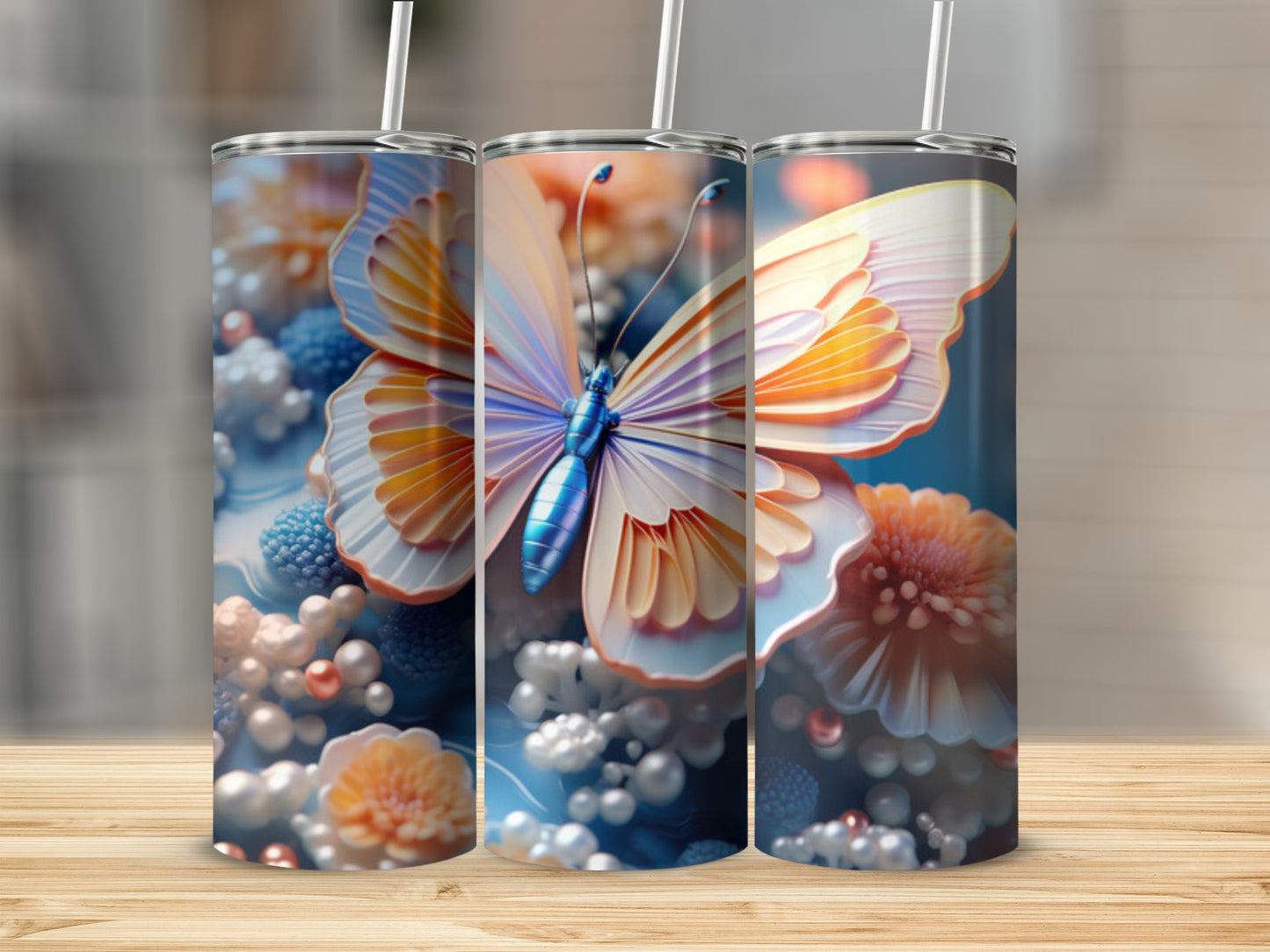 Three tumblers with a vibrant butterfly and floral design.