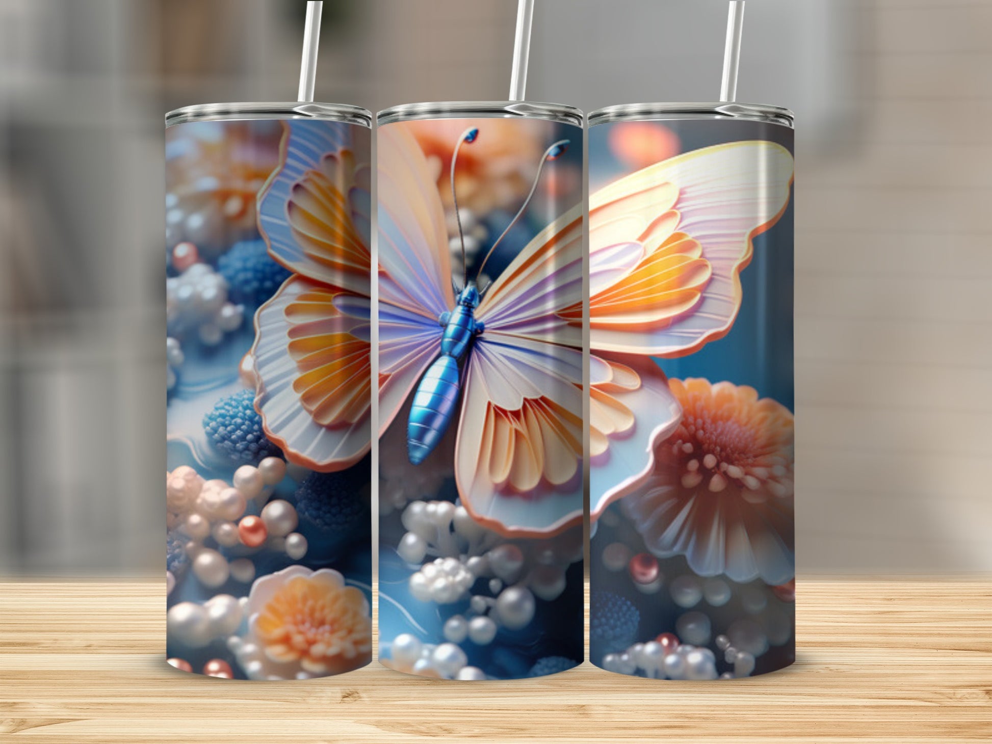 Three tumblers with a vibrant butterfly and floral design.