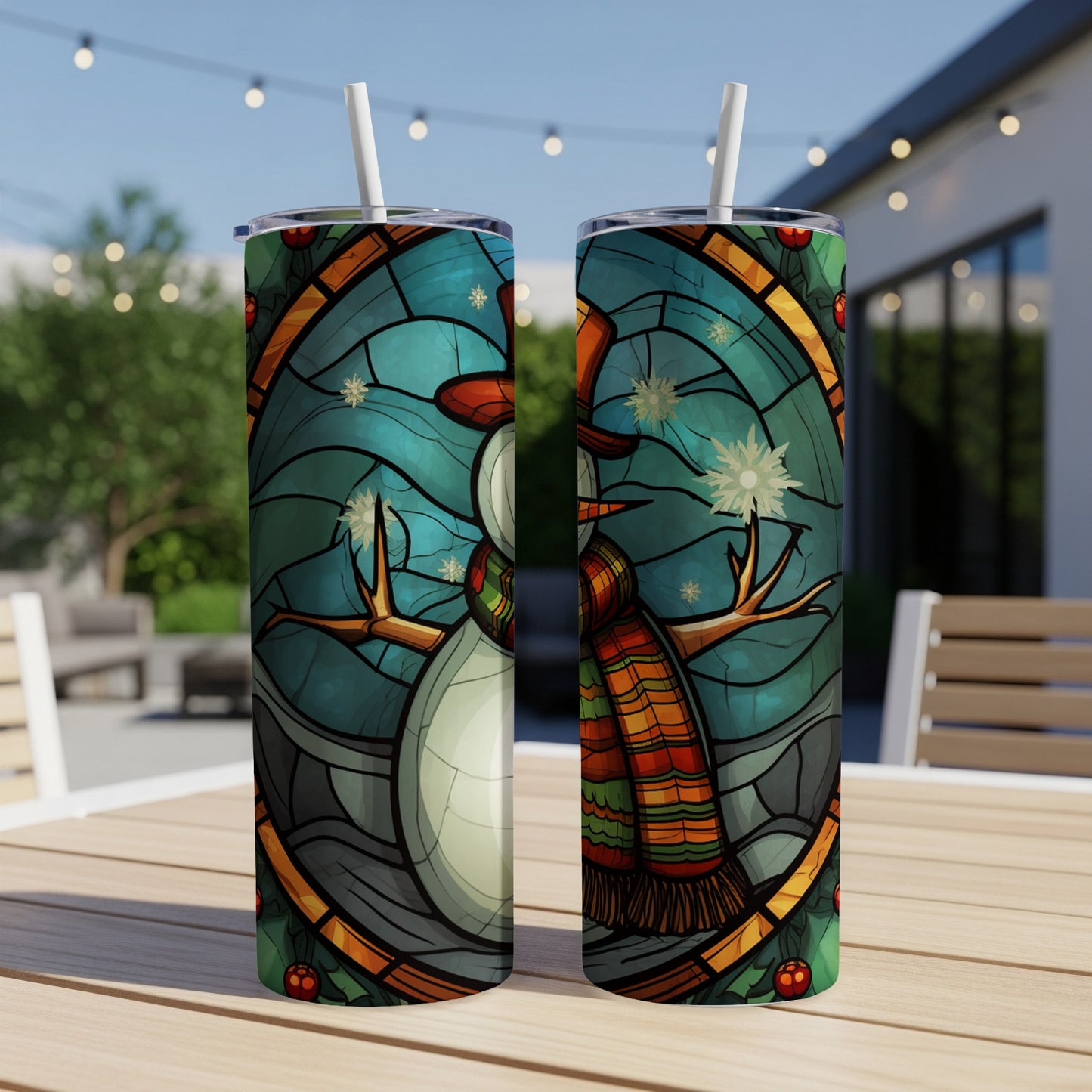 Snowman with snowflake and stained glass design on a tumbler.