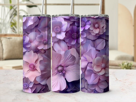 Three tall tumblers adorned with purple and pink floral patterns.