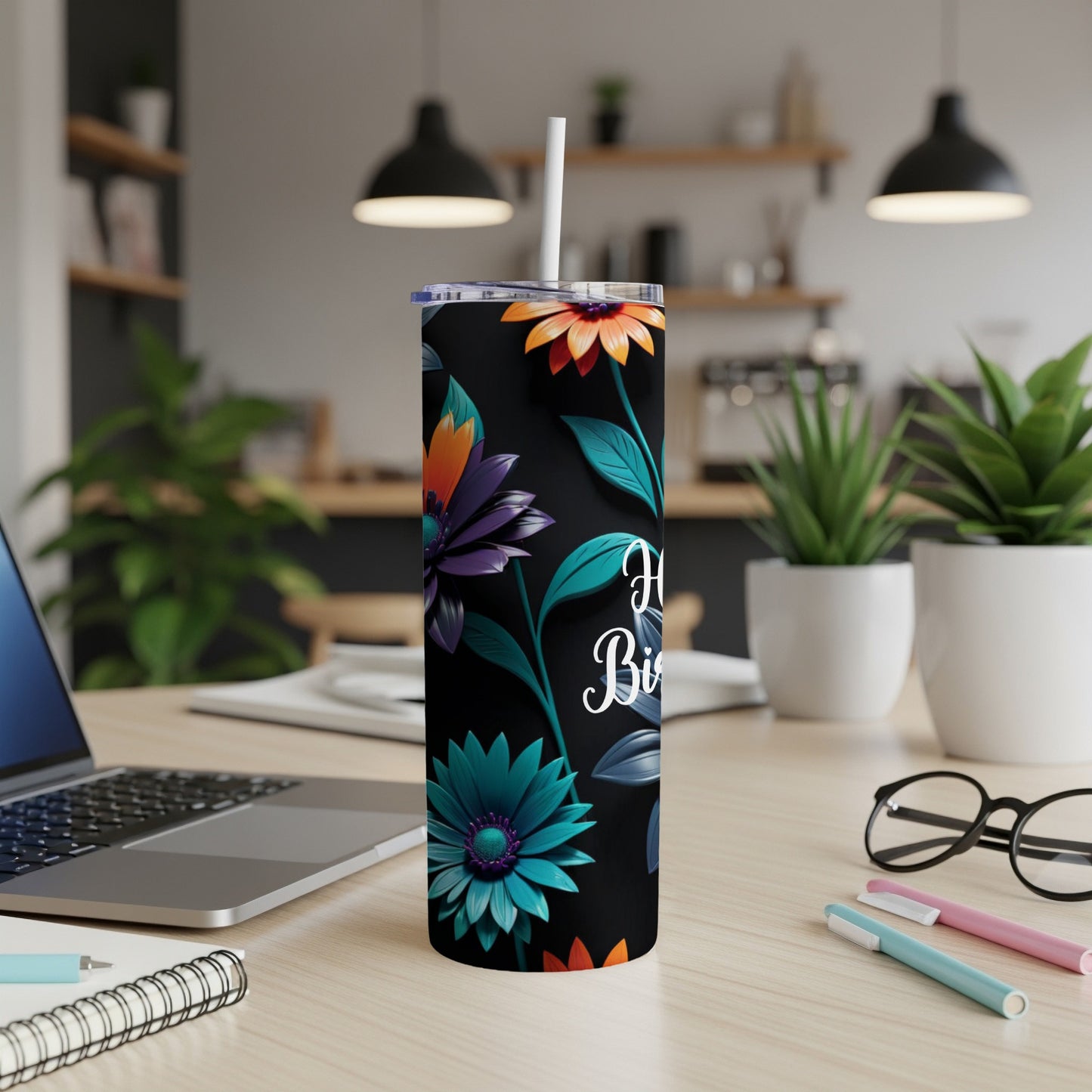 Black tumbler with vibrant floral design and "Happy Birthday" text.