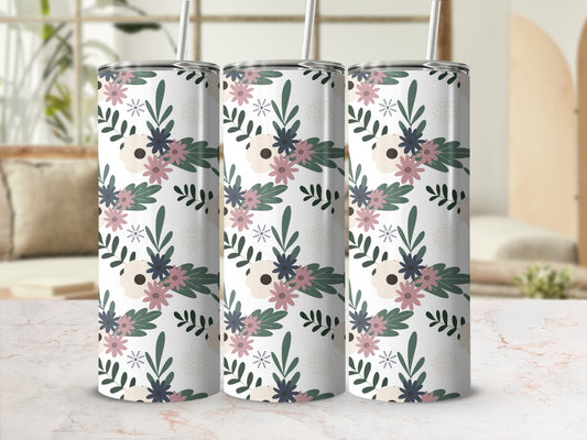 White tumbler with floral pattern and beige background.
