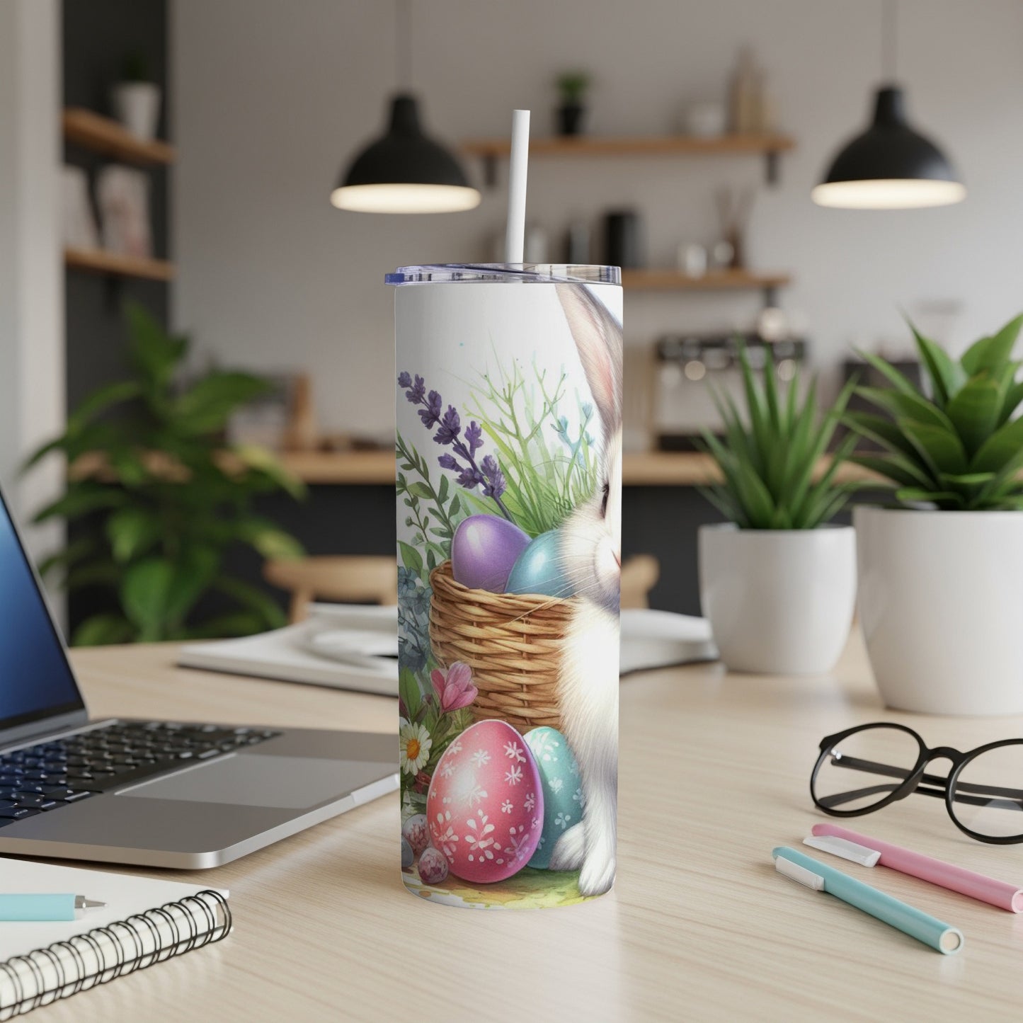 Easter bunny and eggs on a white tumbler with a straw.