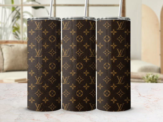Three tumblers with brown Louis Vuitton monogram pattern and straws.