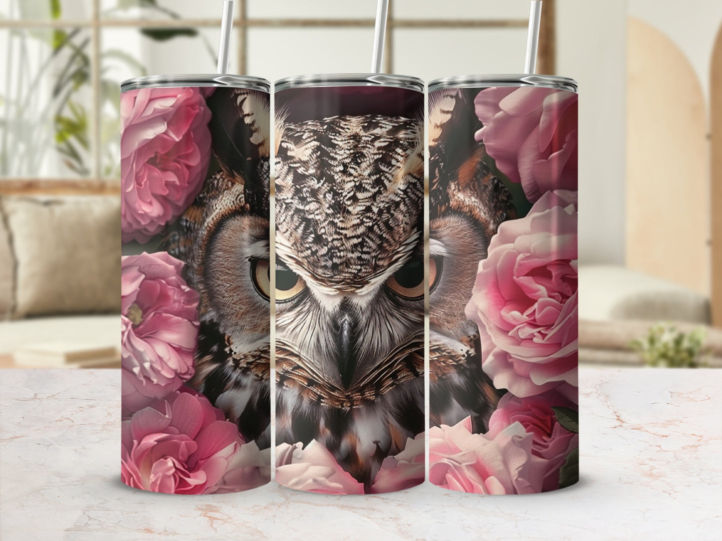 Great horned owl face surrounded by pink roses on a tumbler.
