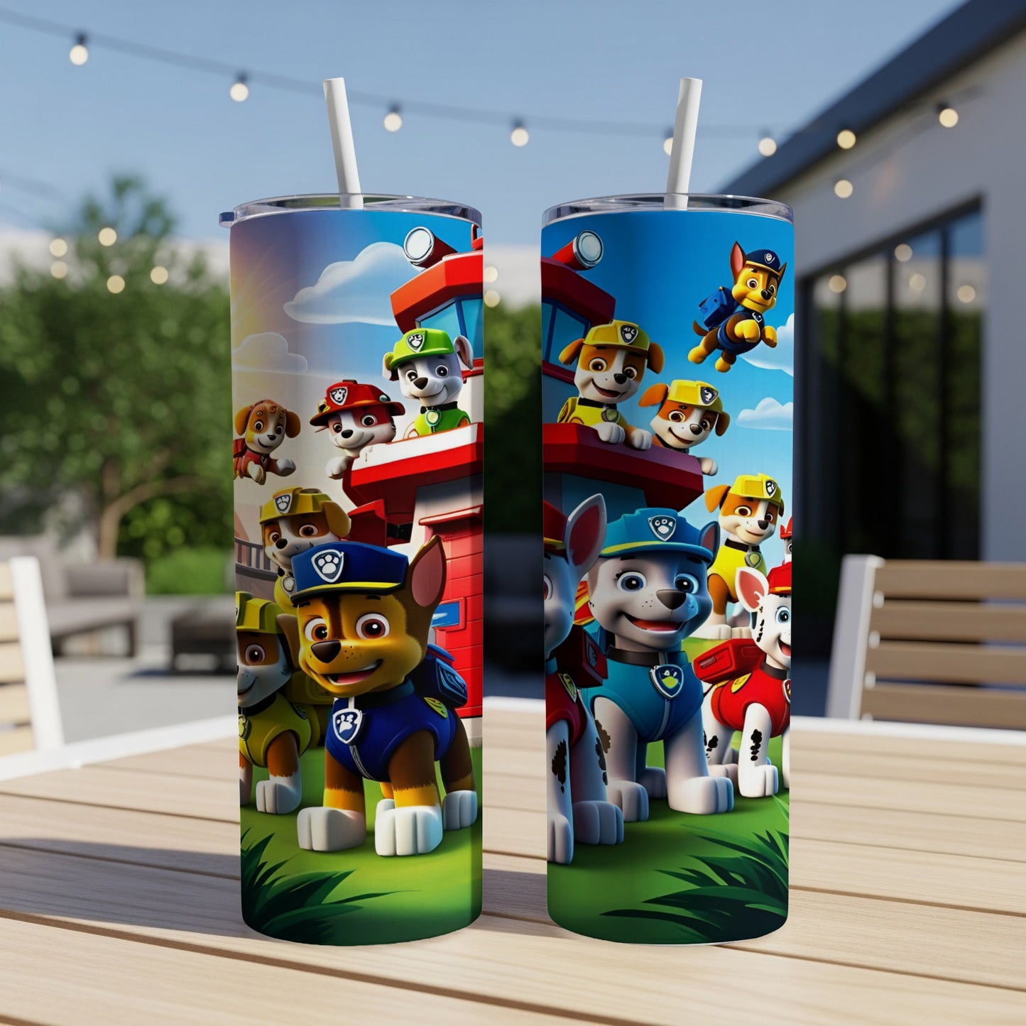 Paw Patrol characters Chase, Marshall, and Ryder on a green grassy hill.