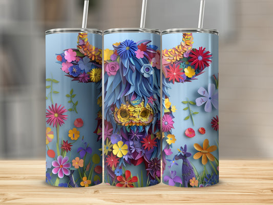 Tall tumbler with floral cow design and straws.