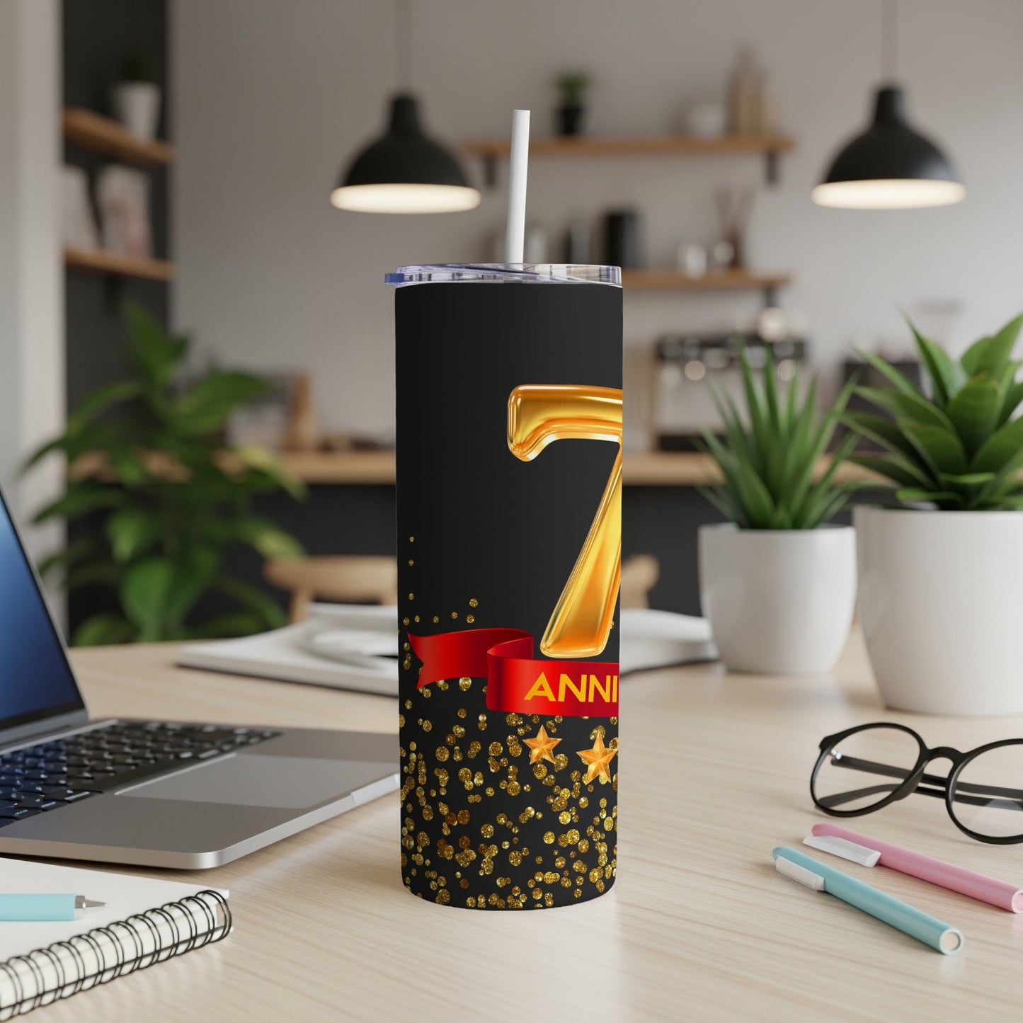 Black tumbler with gold "7 ANNIVERSARY" text and confetti design.