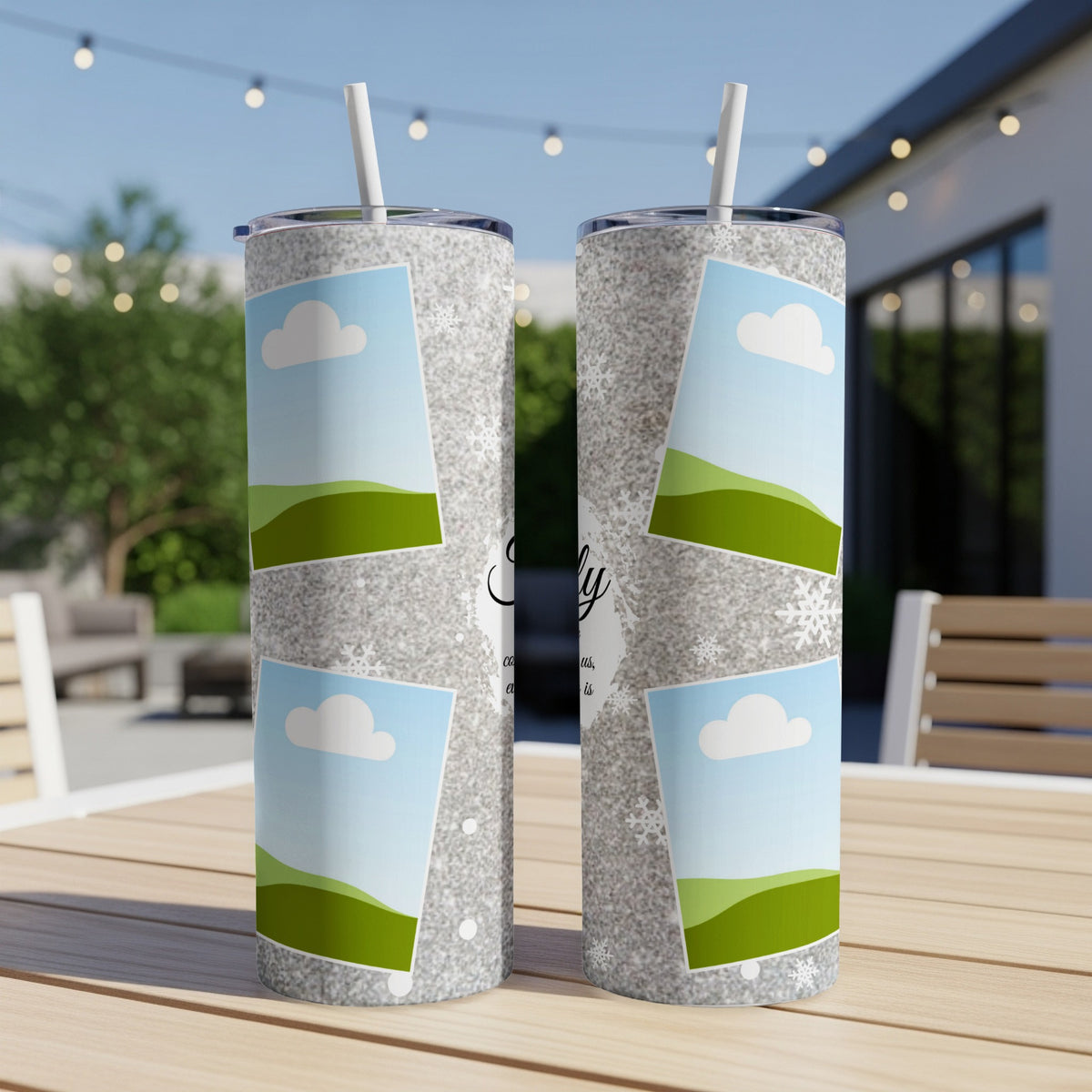 Two silver glitter tumblers with framed landscape photos and subtle snowflake accents.