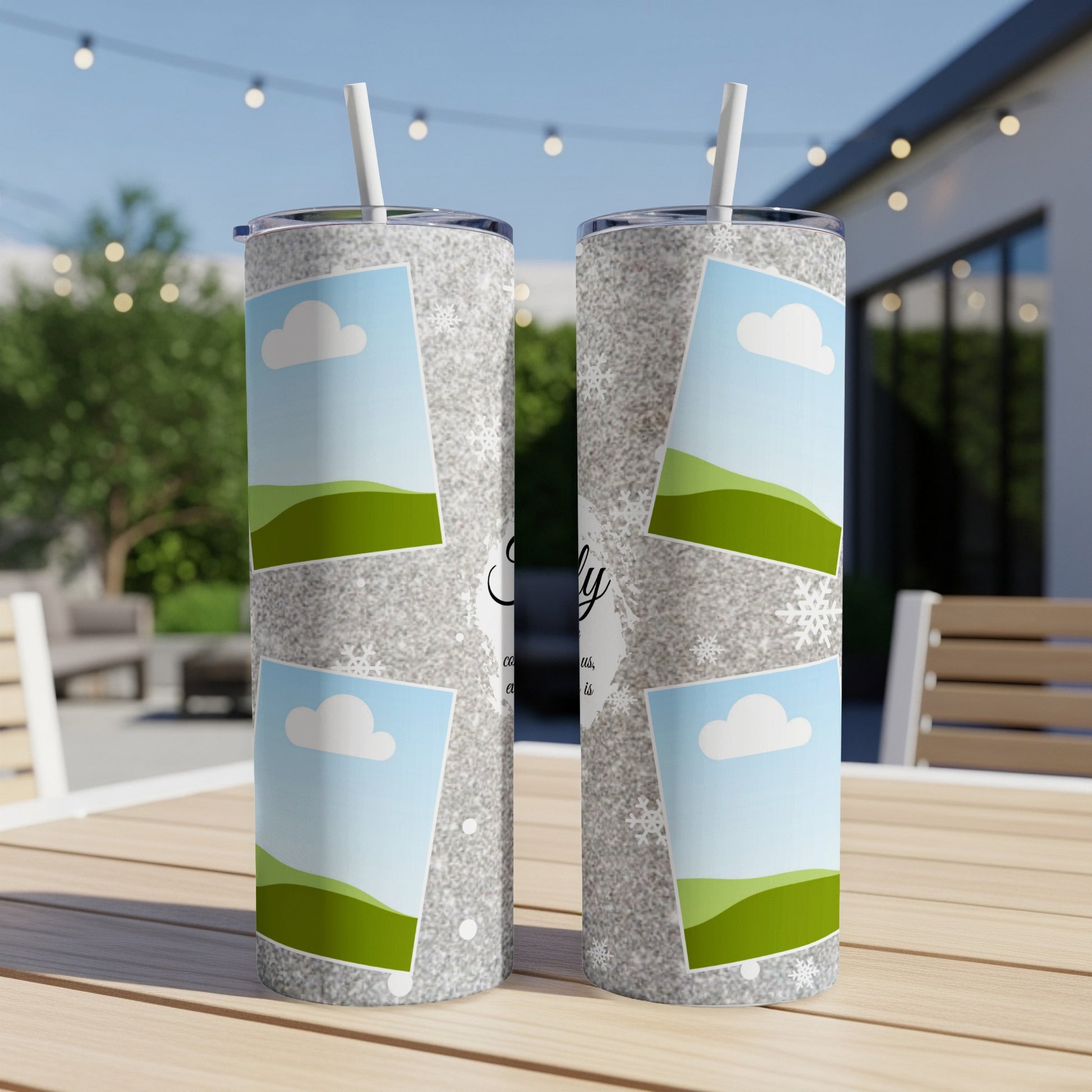 Two silver glitter tumblers with framed landscape photos and subtle snowflake accents.