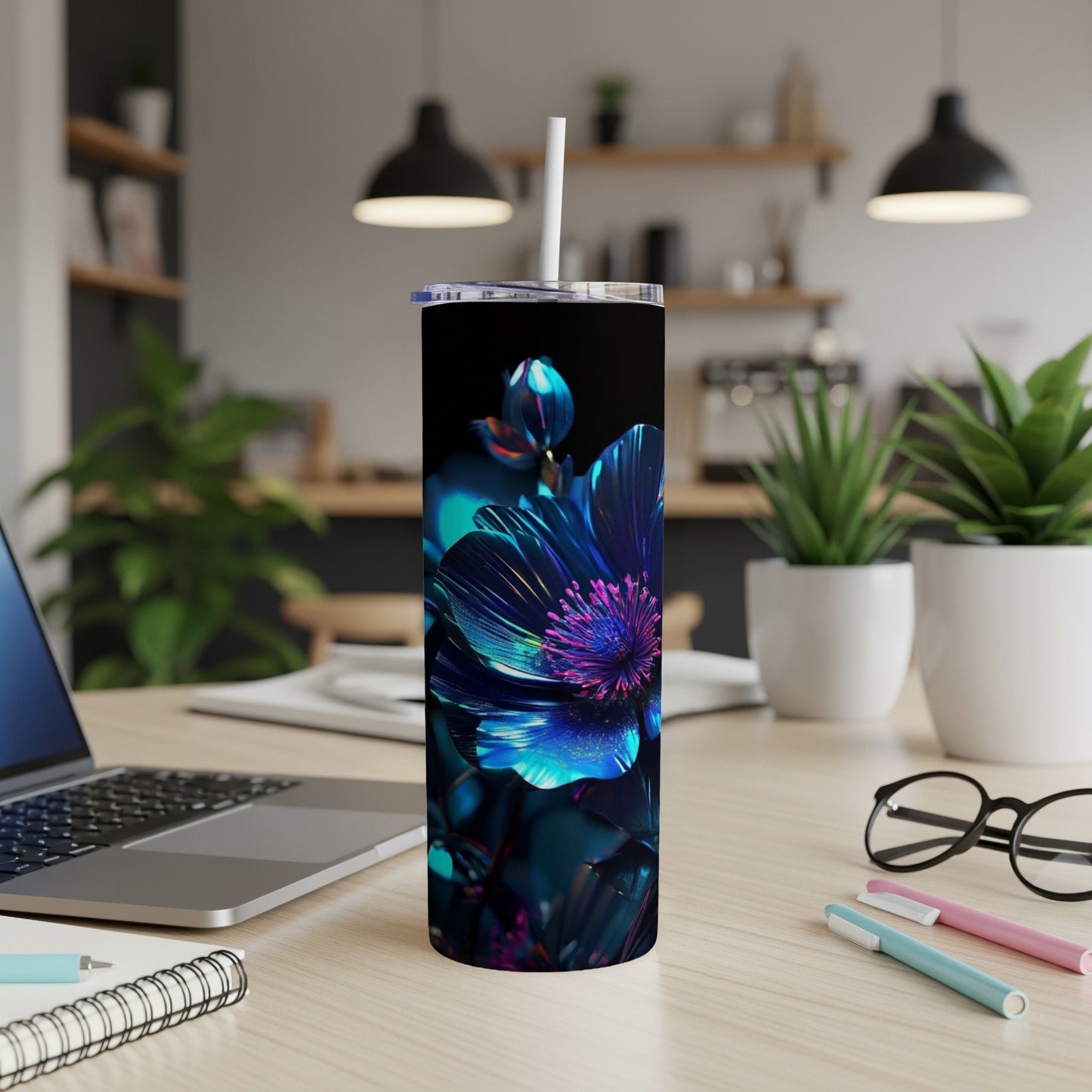 Black tumbler with a vibrant blue and pink iridescent flower design.