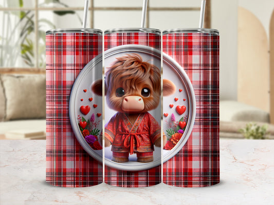 Red plaid tumbler featuring a cartoon highland cow wearing a red robe.