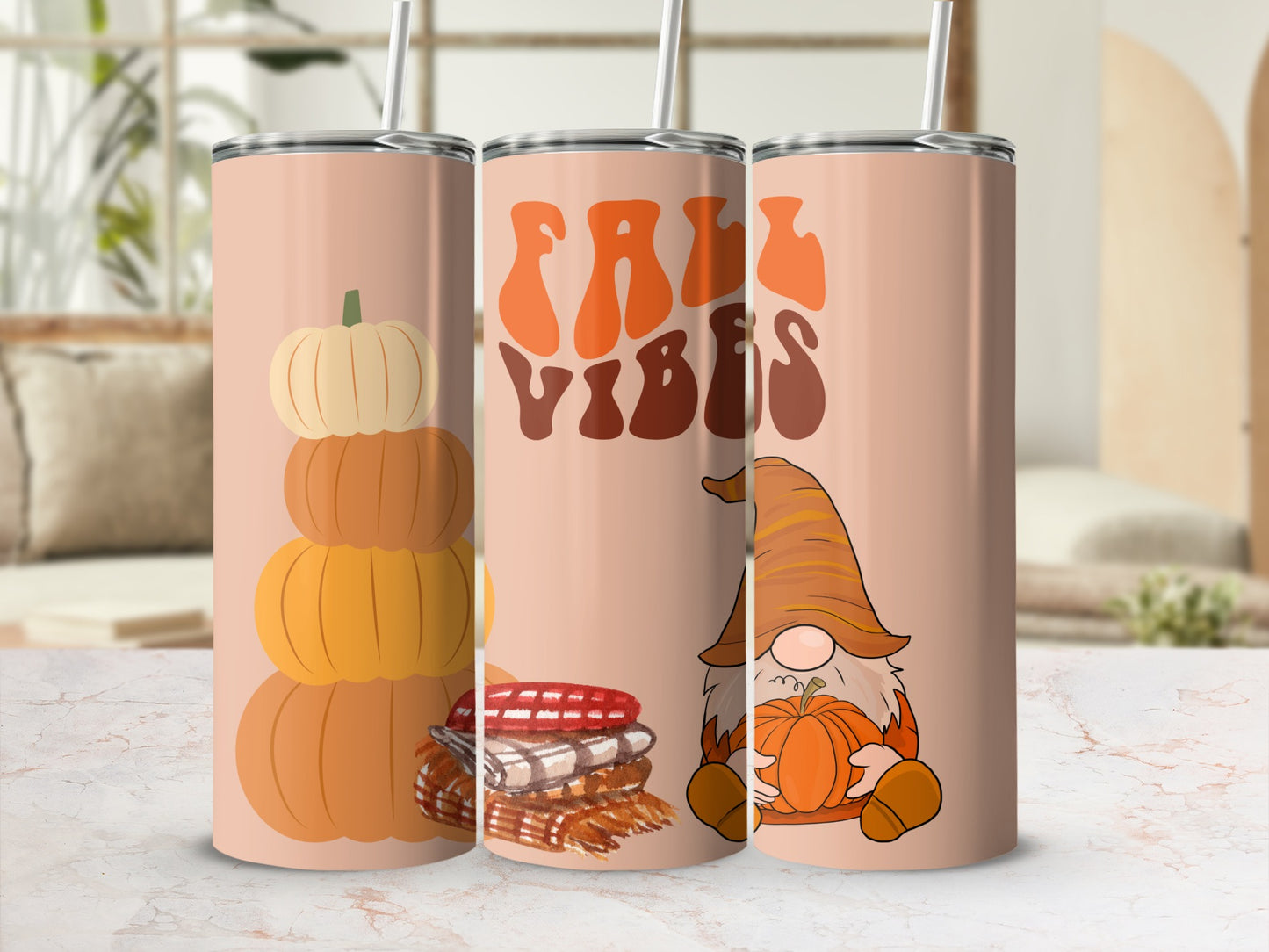Tumbler with stacked pumpkins, plaid, and gnome.