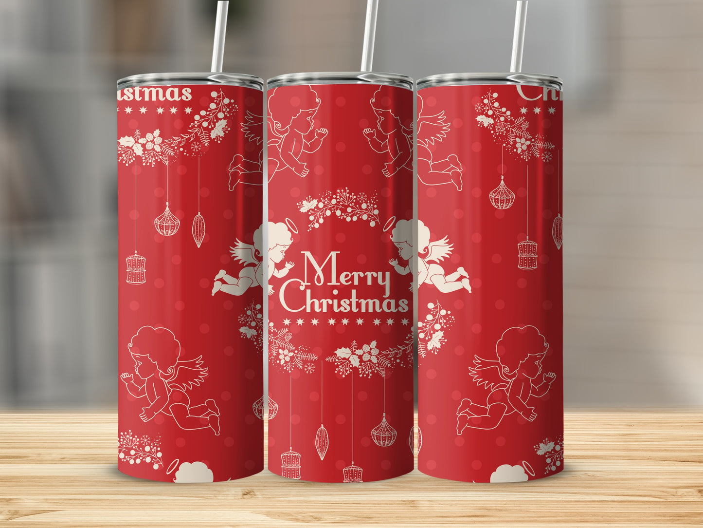 Red tumbler with Merry Christmas design and cherubs.