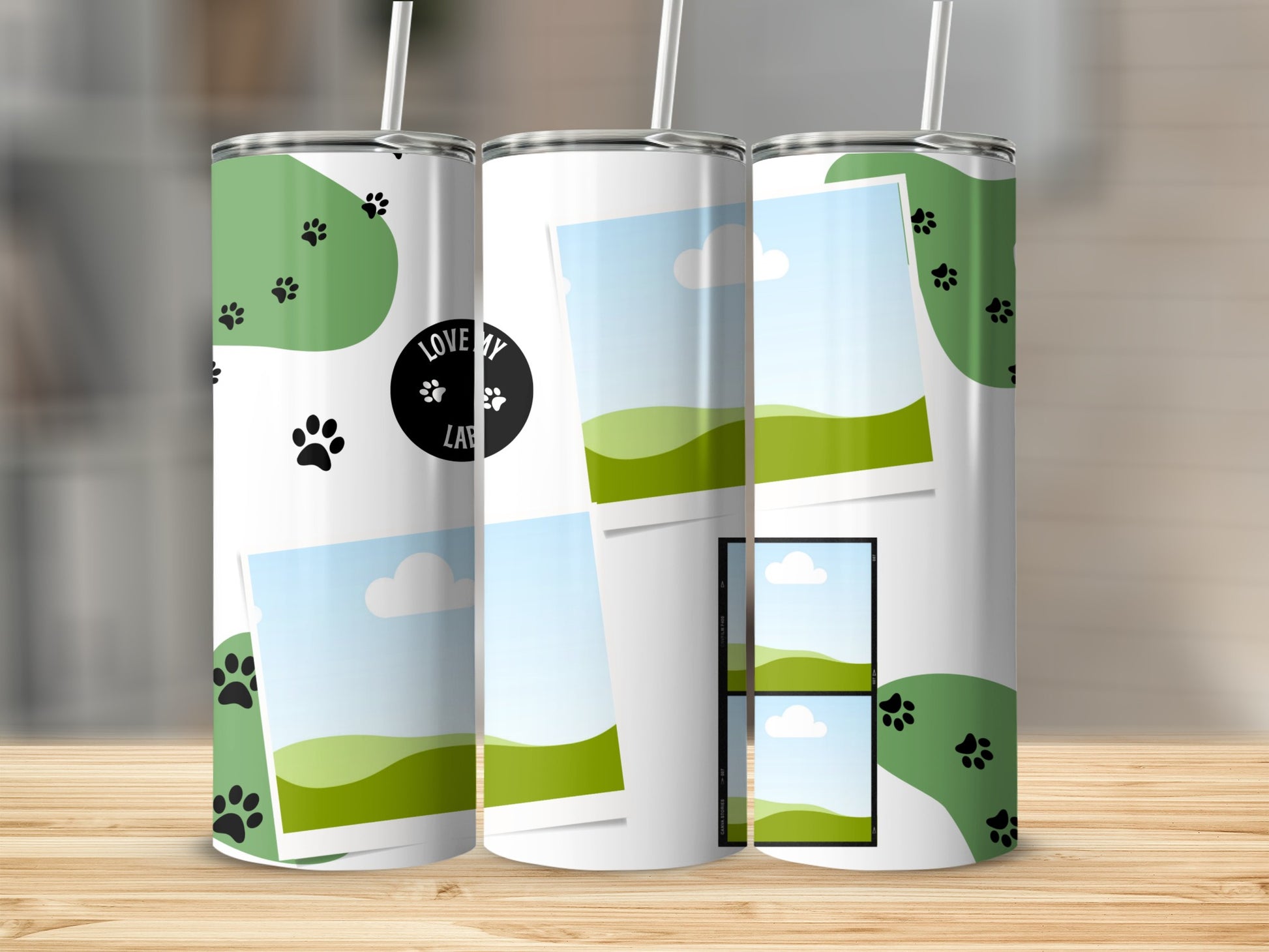 Tumblers with green paw print design and photo frames.