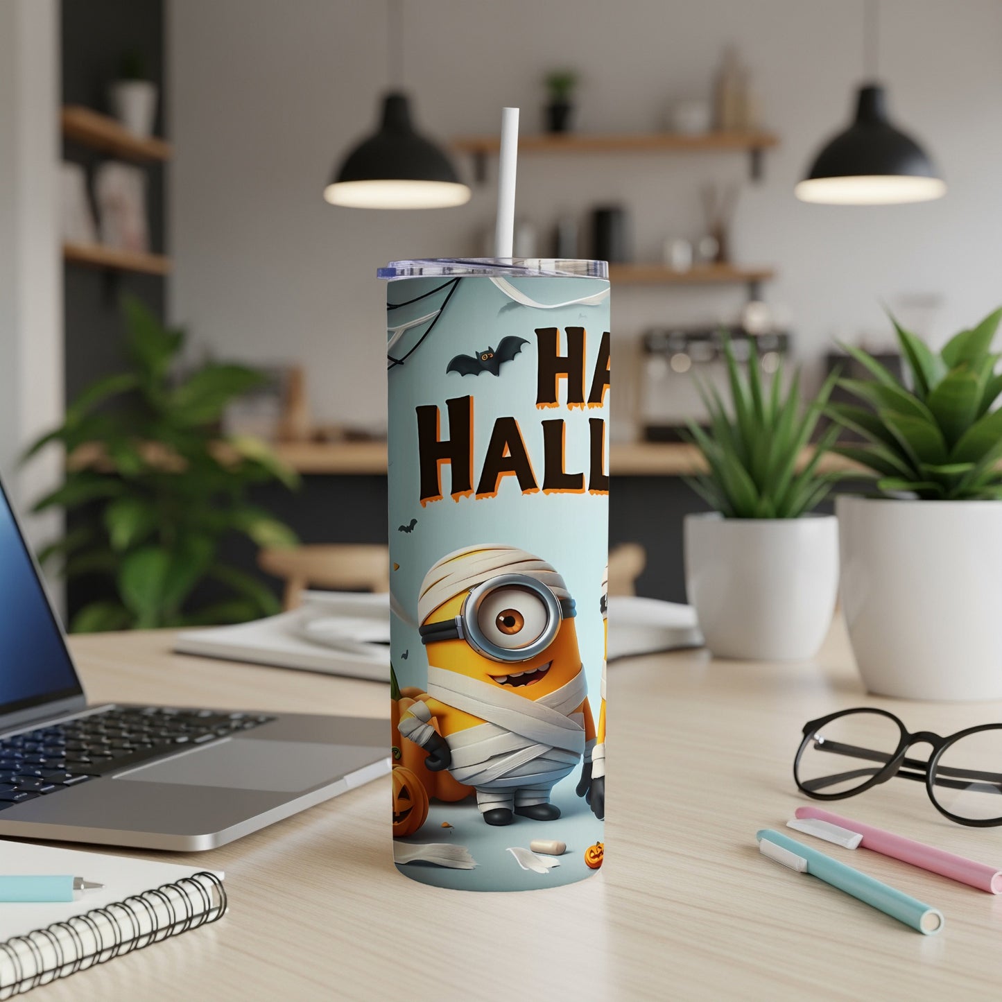 Minion mummy tumbler with "Happy Halloween" text and bats.