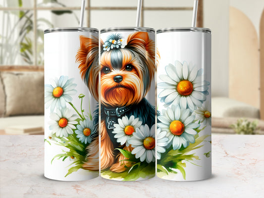 Yorkshire terrier with daisies on three white tumblers.