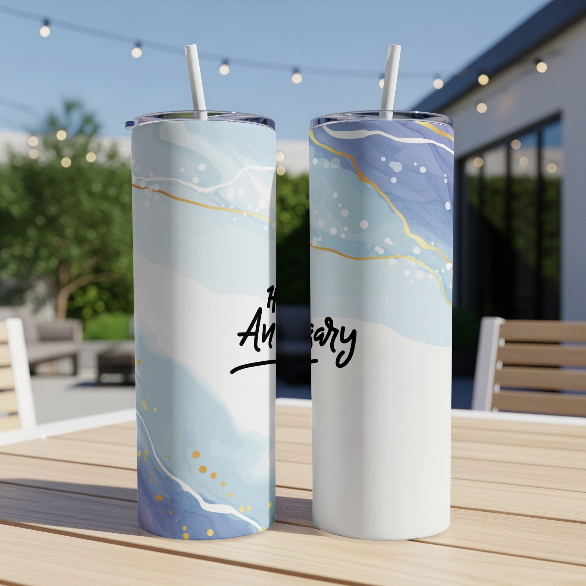 Anniversary tumbler with blue marble and gold accents.