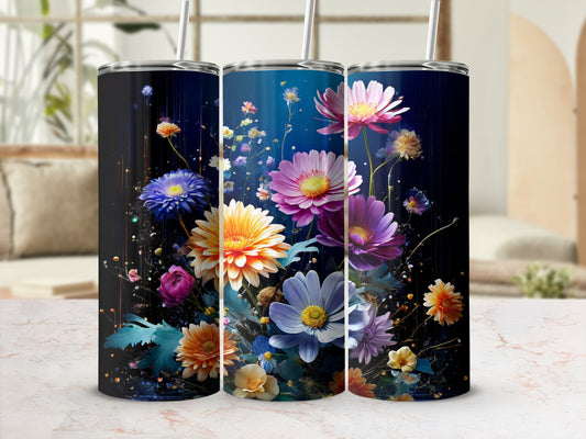 Three tumblers with a vibrant floral design on a blurred background.