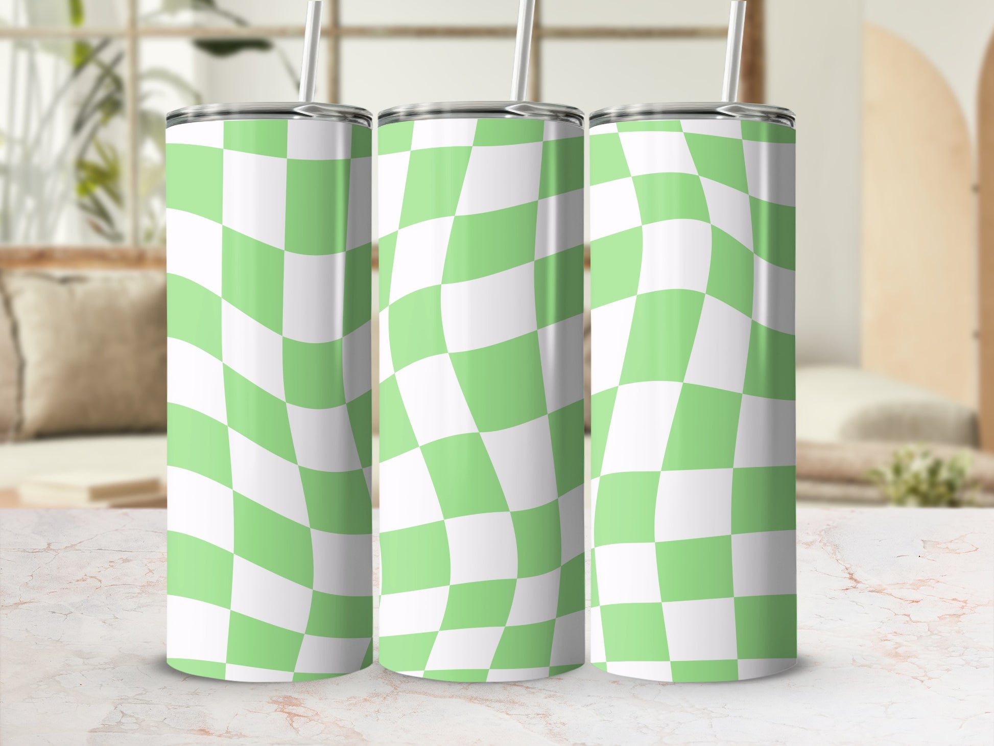 Three tumblers with a warped green and white checkerboard pattern.