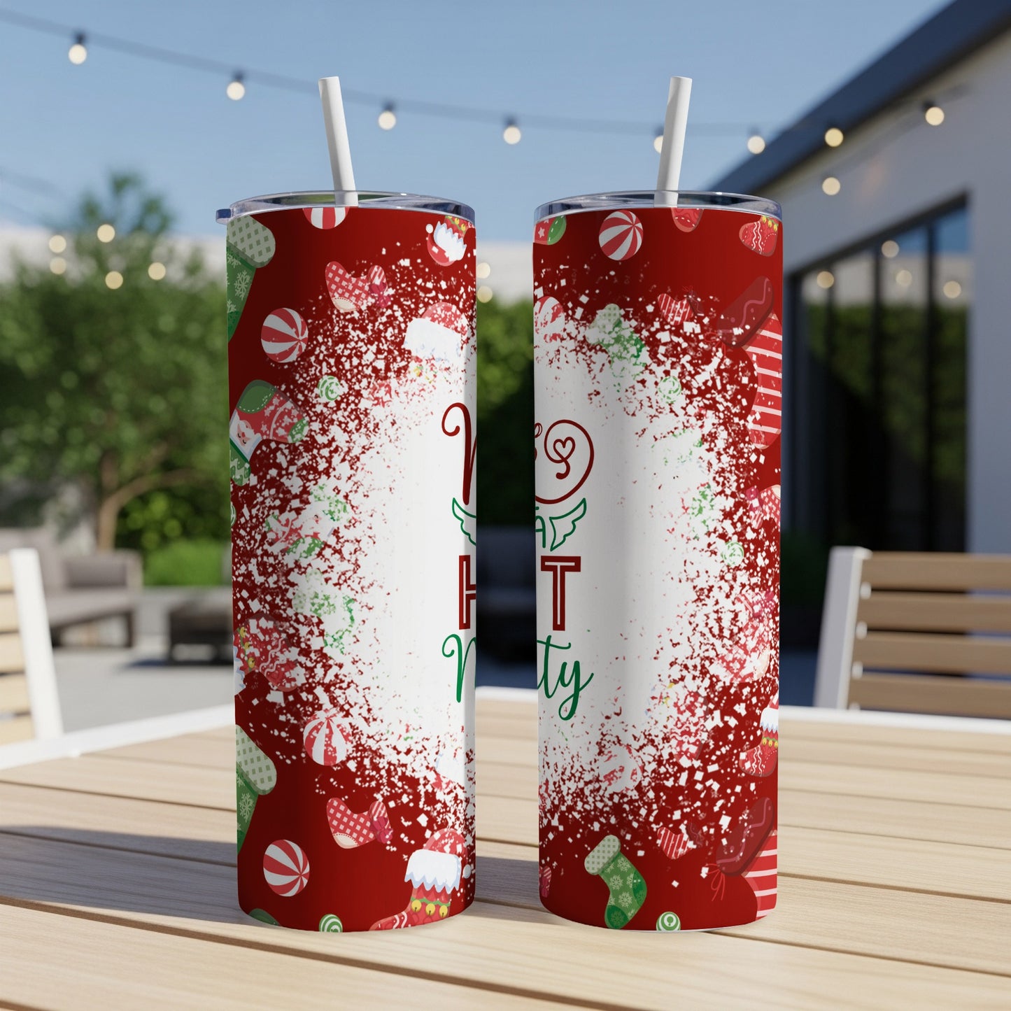 Red and white speckled tumbler with "Merry and Bright" and Christmas icons.