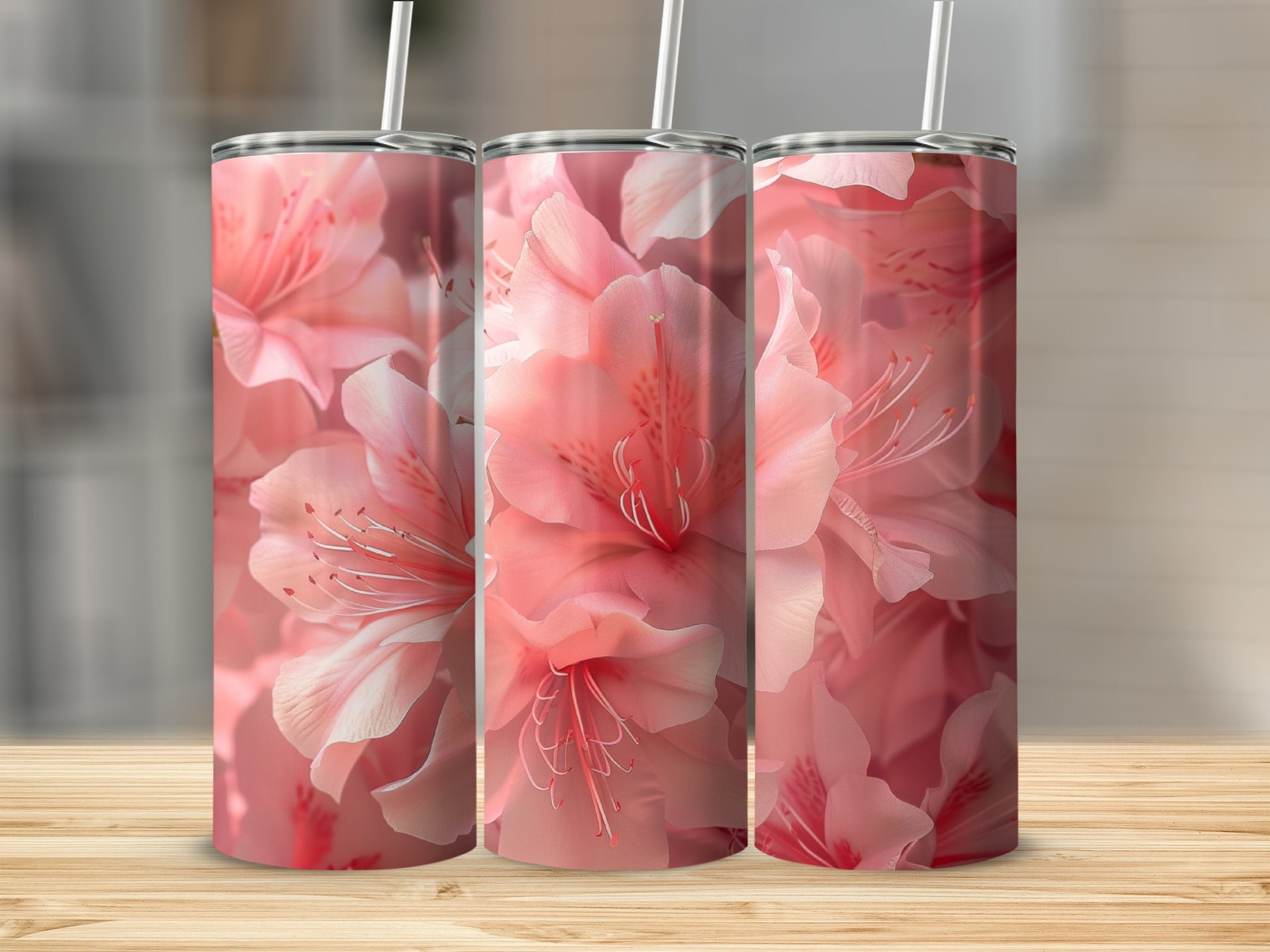 Pink azalea flowers on a skinny tumbler.