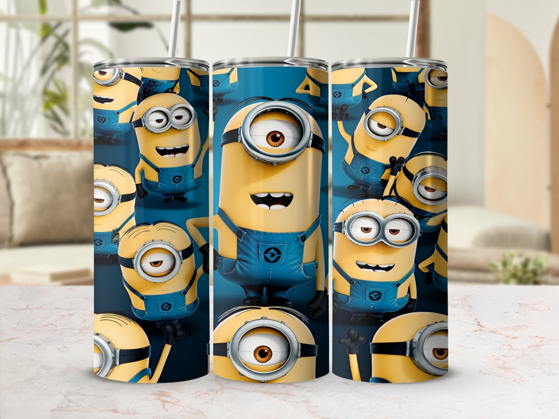 Three tall tumblers featuring a repeating pattern of cartoon Minions in blue overalls.