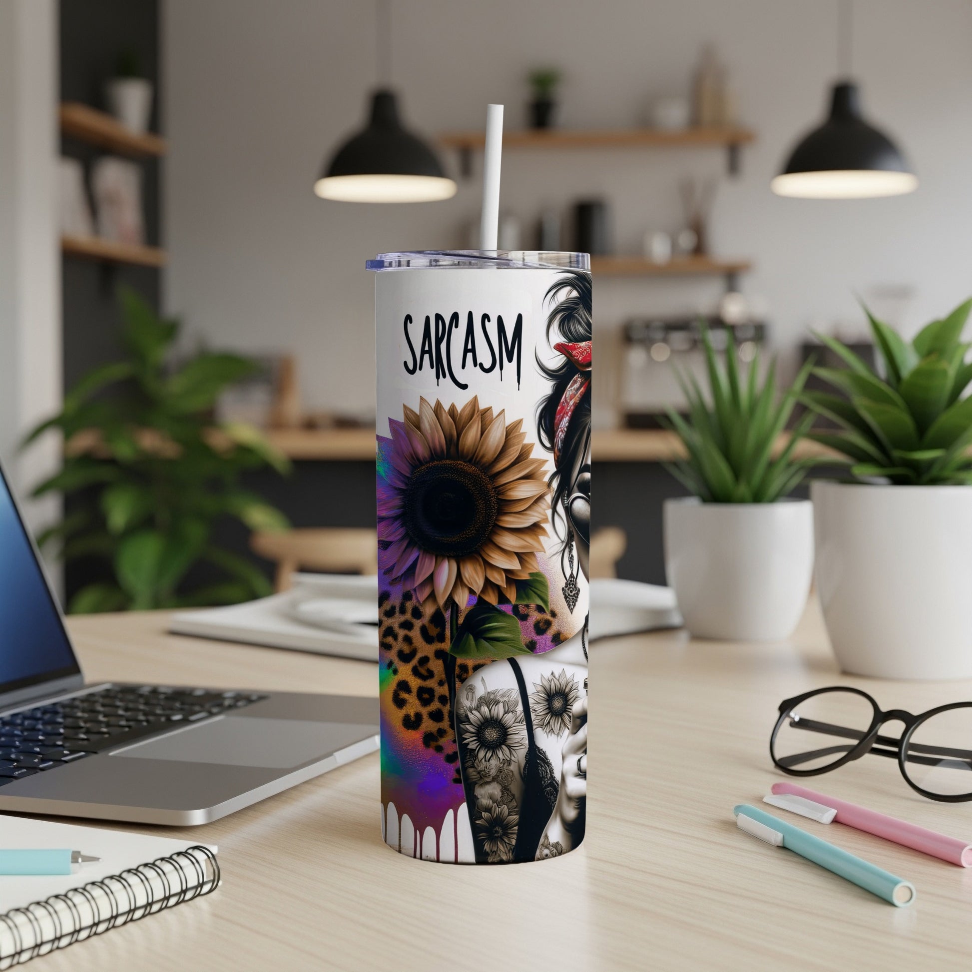 Tumbler with leopard print, sunflower, and skull designs, "Sarcasm" text.