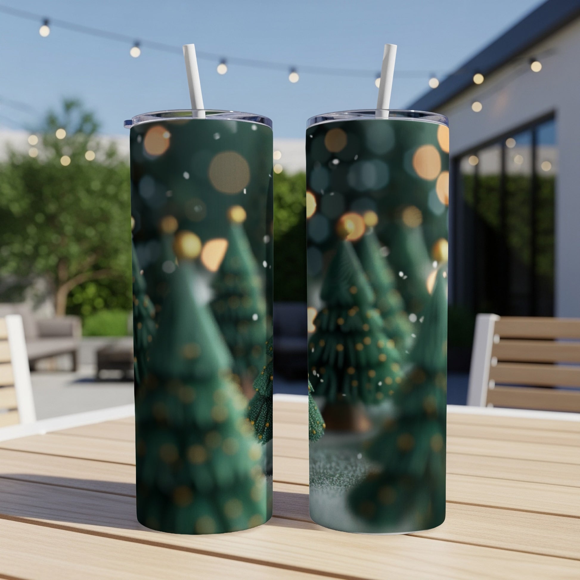 Two green Christmas trees on tumblers with a bokeh background.