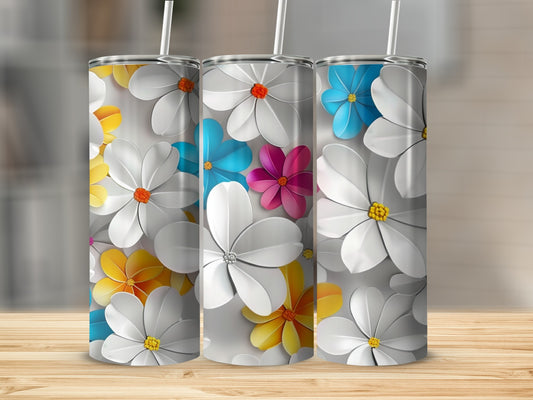 Three tumblers with white and colorful floral patterns arranged side-by-side.