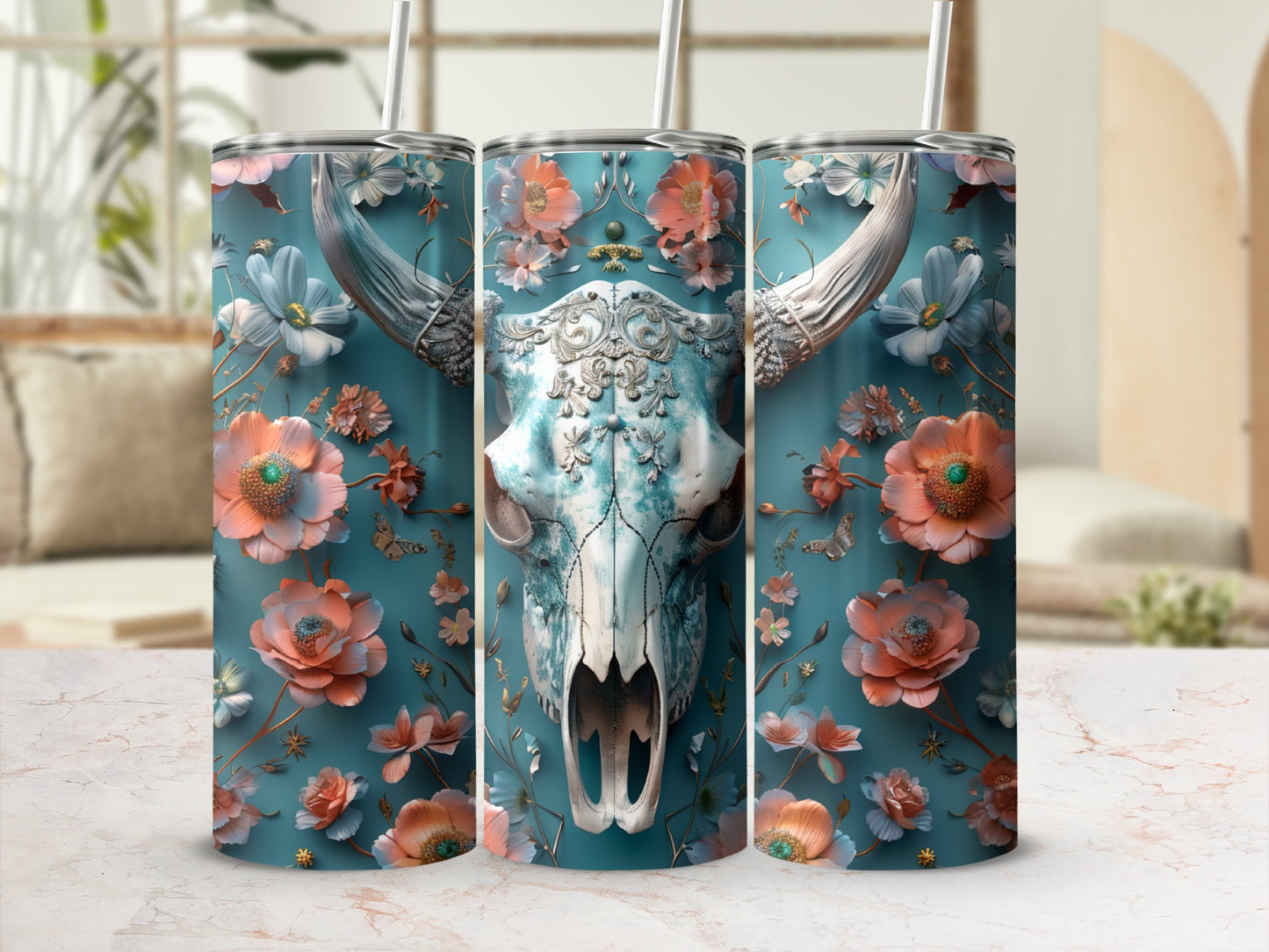 Floral skull tumbler with straws, on marbled surface.