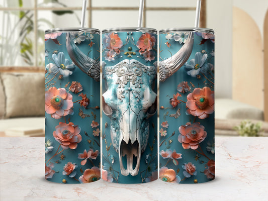 Floral skull tumbler with straws, on marbled surface.