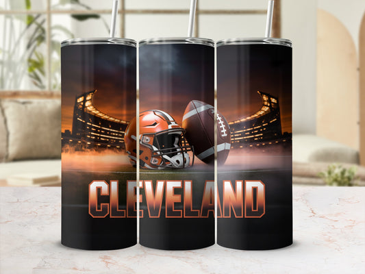 Cleveland football helmet and ball on stadium background tumbler.