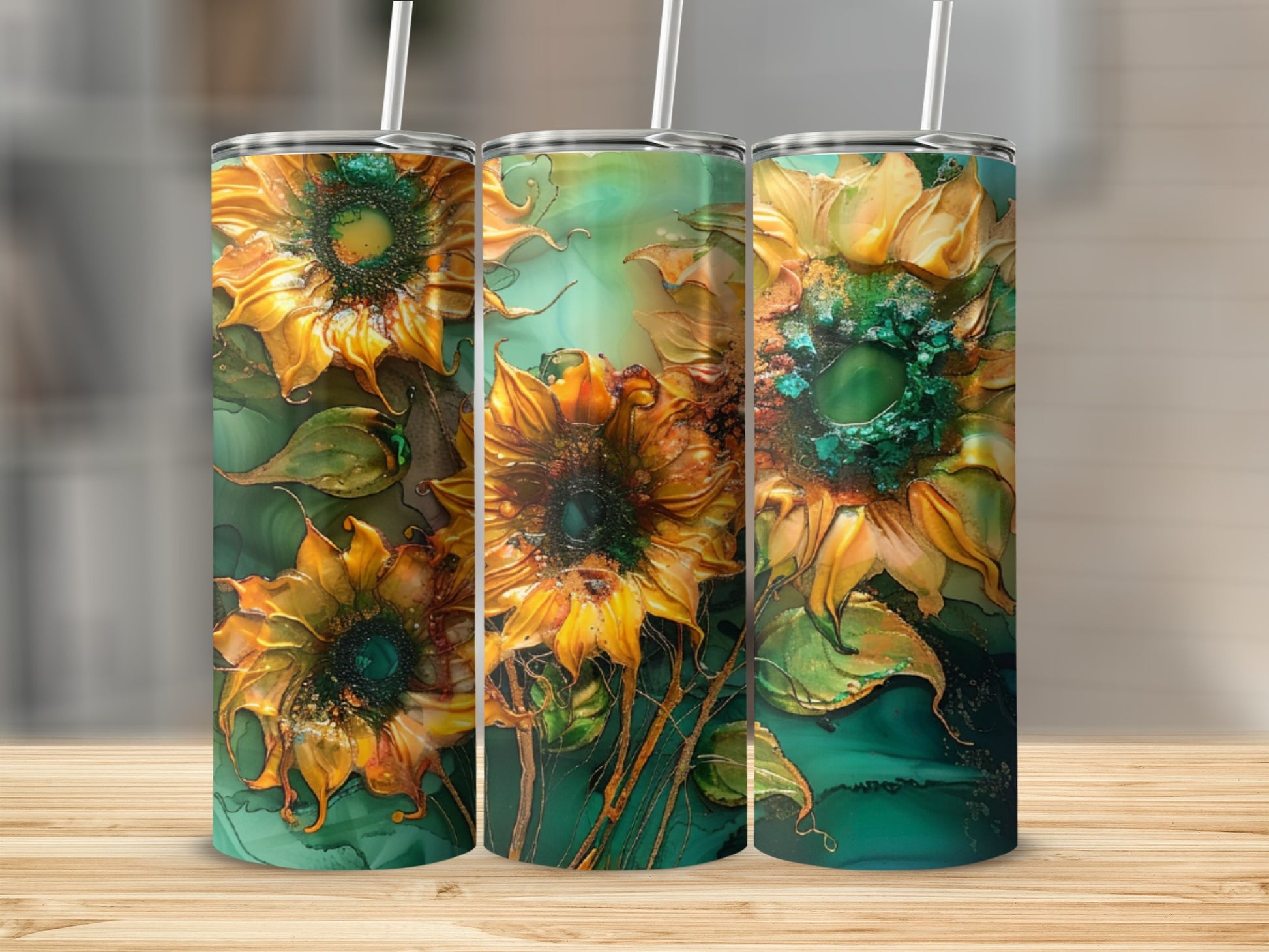Three tall tumblers with embossed sunflowers and green abstract background.