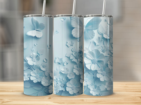 Three light blue tumblers with raised floral and butterfly designs.