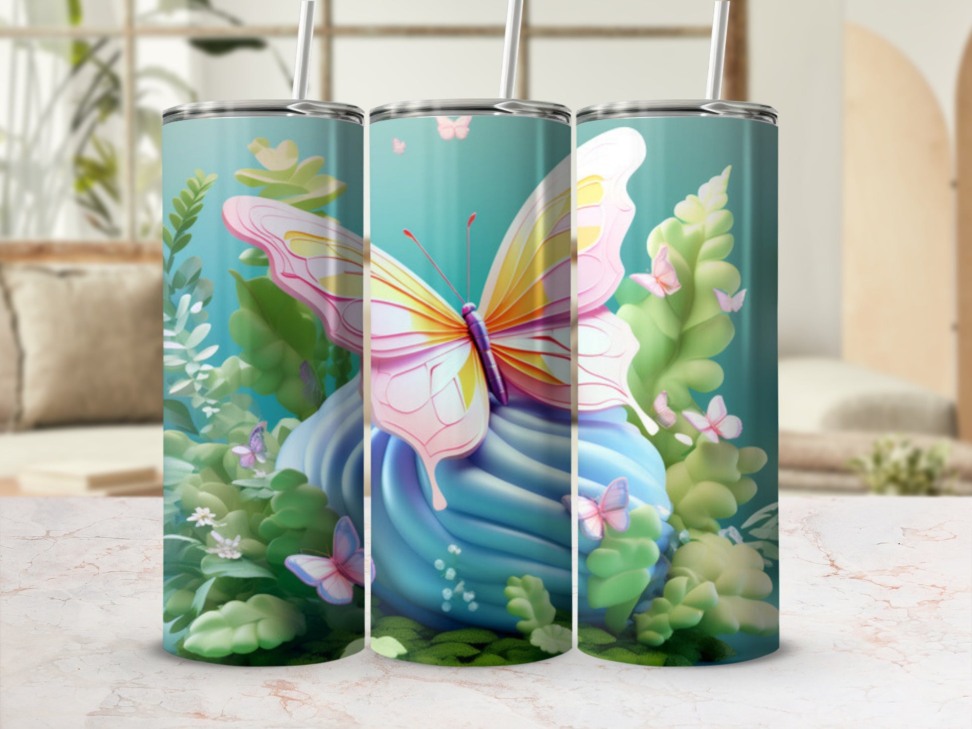Butterfly and floral design on a blue tumbler with two straws.