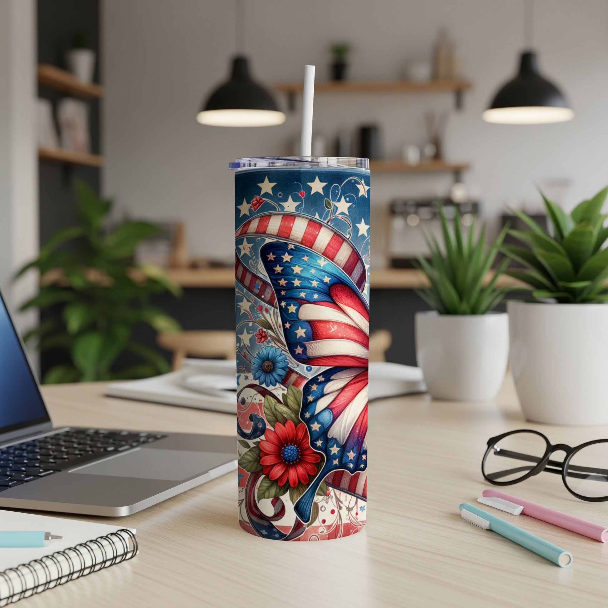 American flag patriotic tumbler with patriotic designs and flowers.