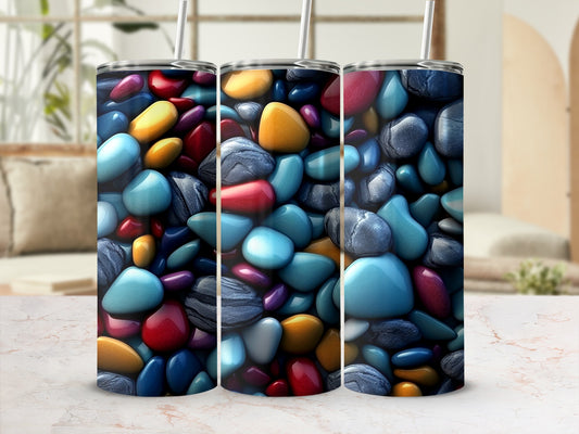Three tumblers featuring a colorful, textured pebble mosaic design.