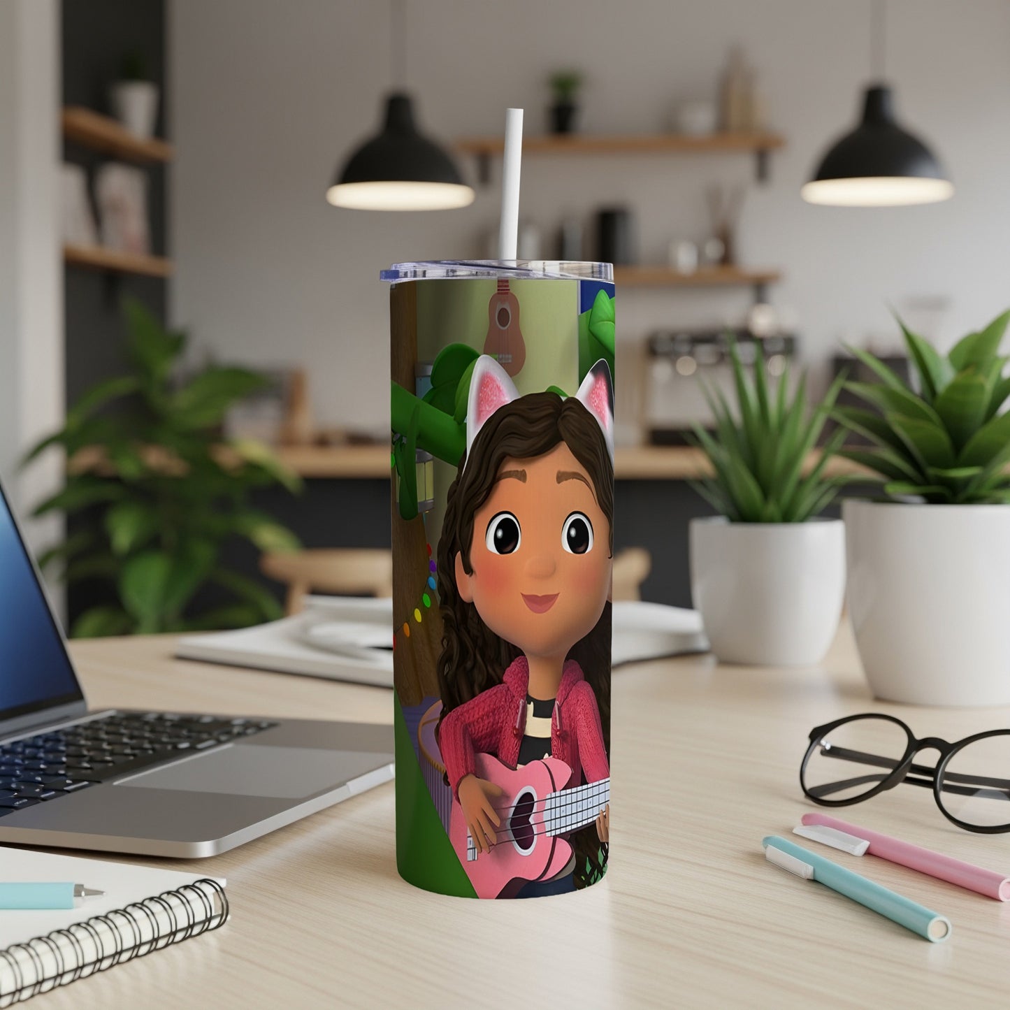 Gabby's Dollhouse character holding a pink ukulele on a tumbler.