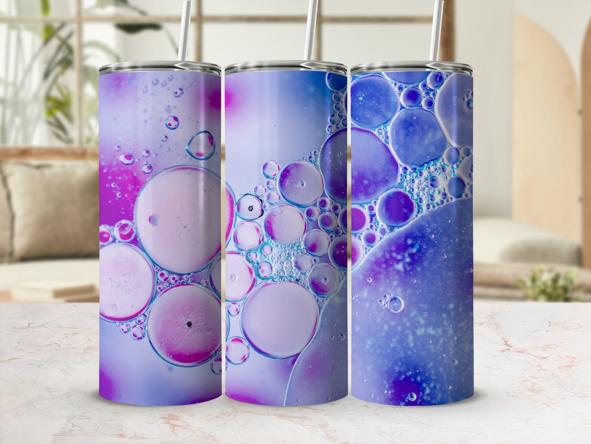 Three tumblers with a purple and blue abstract bubble pattern.
