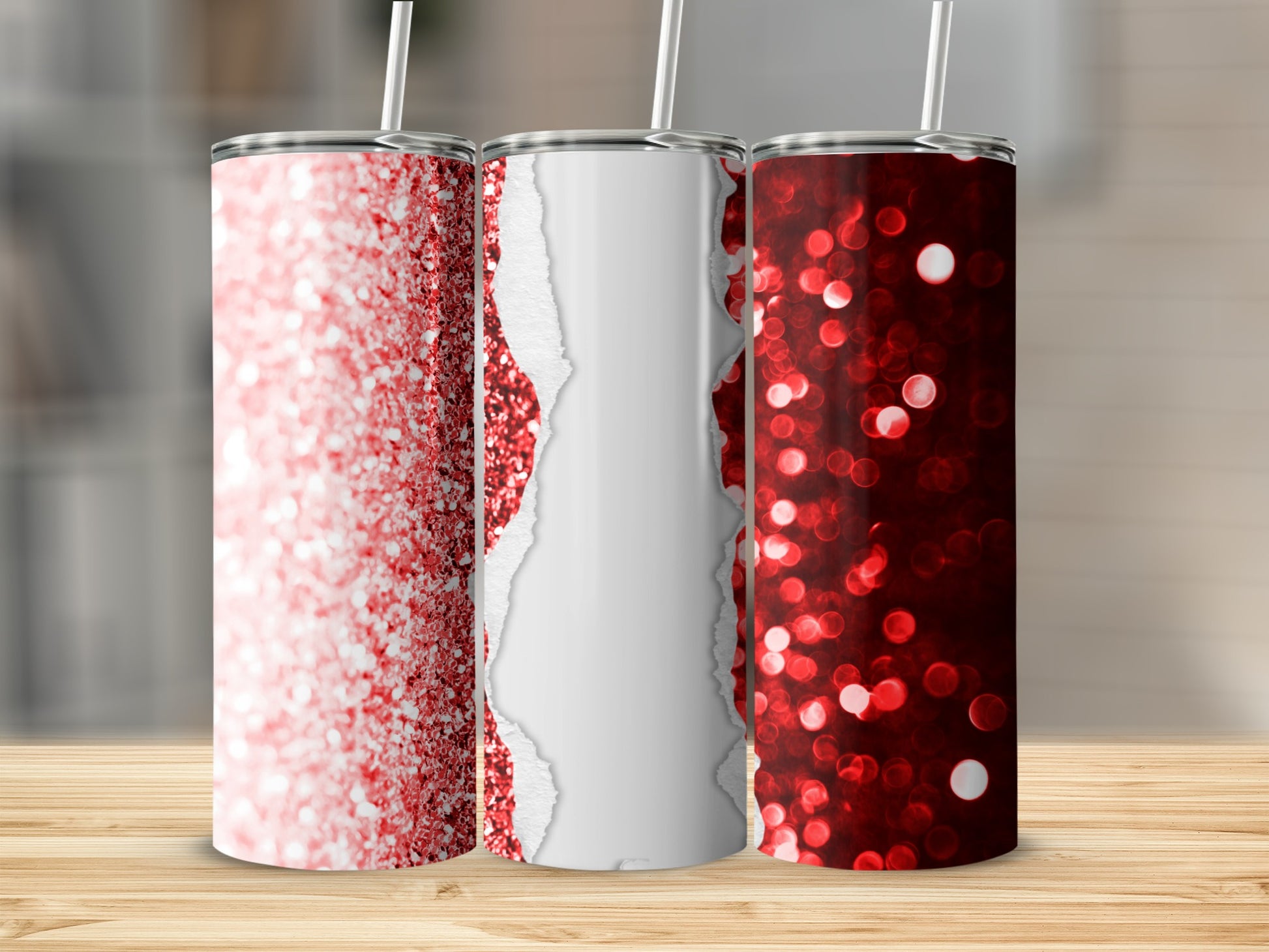 Three red glitter tumblers with white paper torn in the center.