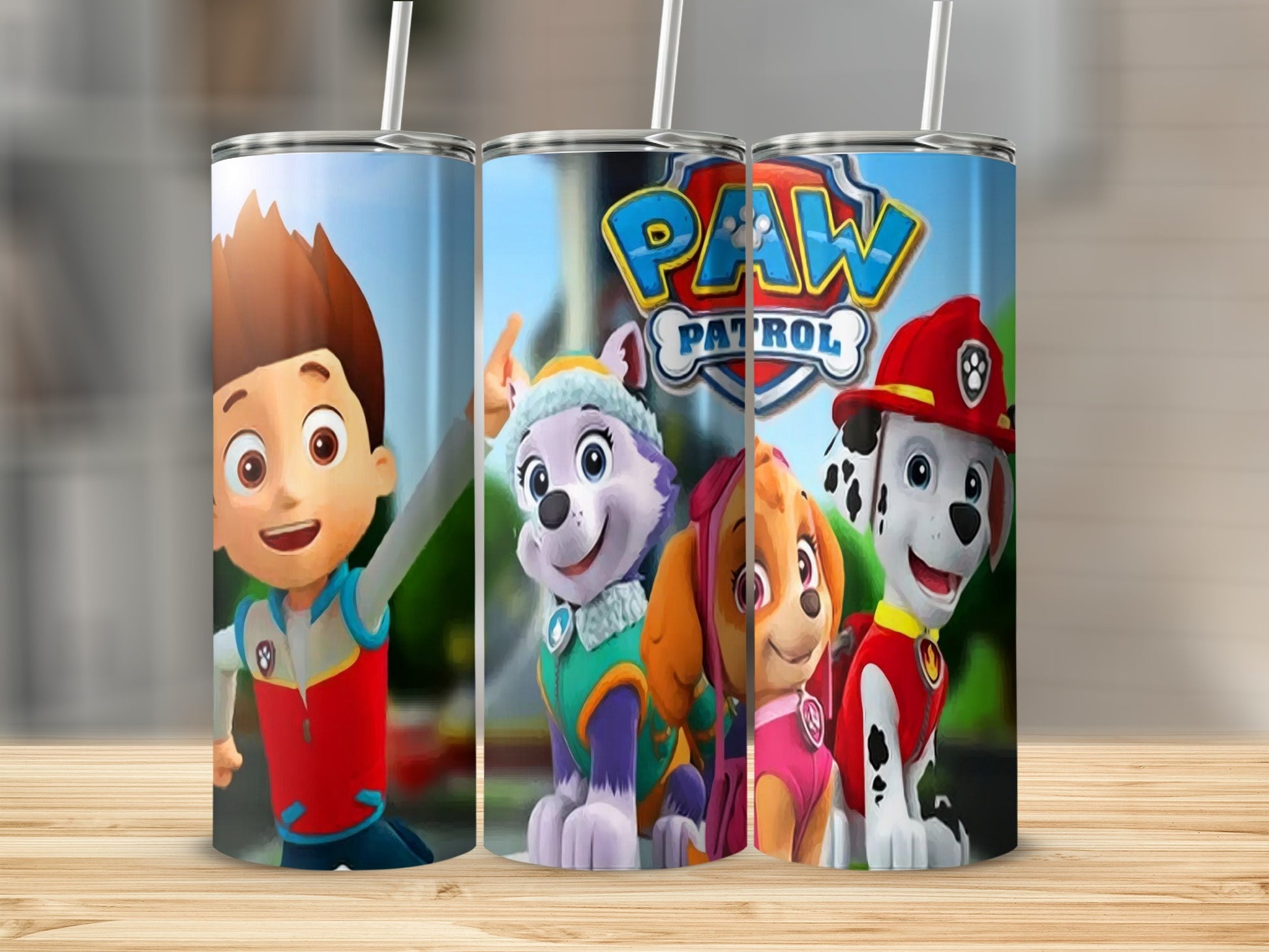 Paw Patrol characters Ryder, Everest, Skye, and Chase on a stainless steel tumbler.